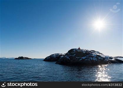 Sunlit rocky island, Svolvaer, Lofoten Islands, Norway