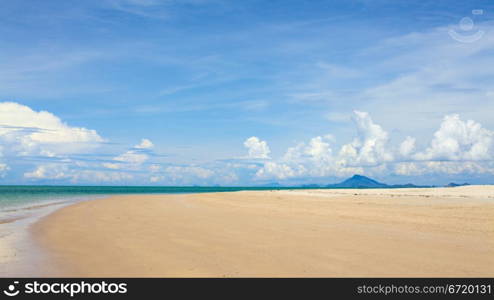 sunny beach, blue ocean and clean sky