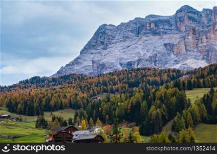 Sunny colorful autumn alpine Dolomites rocky mountain scene, Sudtirol, Italy. Peaceful view from alpine path road. Picturesque traveling, seasonal, nature and countryside beauty concept scene.