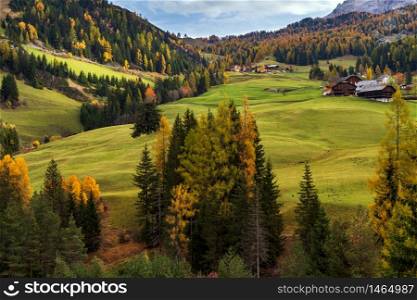 Sunny colorful autumn alpine Dolomites rocky mountain scene, Sudtirol, Italy. Peaceful view from alpine pass road. Picturesque traveling, seasonal, nature and countryside beauty concept scene.