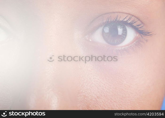 sunny macro photo of a mulatto female eye