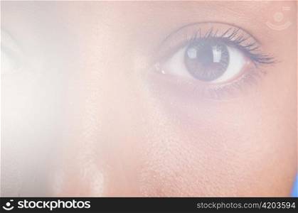 sunny macro photo of a mulatto female eye