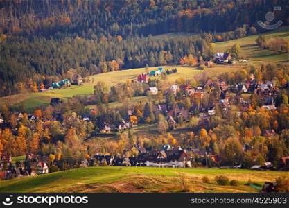 Sunny October day in Malopolska mountain village. Autumn in Poland