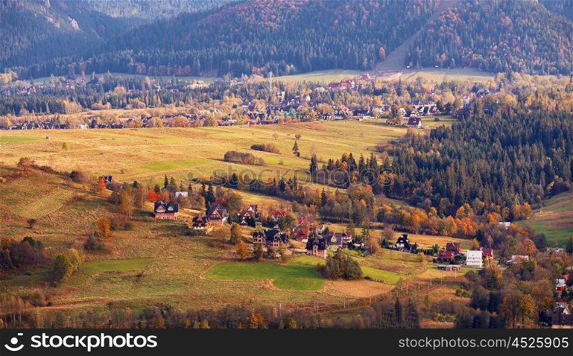 Sunny October day in Malopolska mountain village. Autumn in Poland