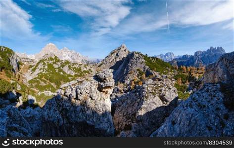 Sunny picturesque autumn alpine Dolomites rocky mountain view from hiking path from Giau Pass to Cinque Torri  Five pillars or towers  rock famous formation, Sudtirol, Italy.
