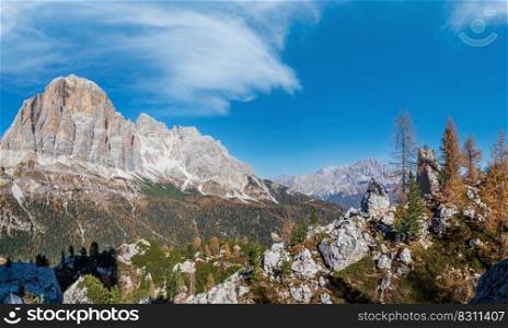 Sunny picturesque autumn alpine Dolomites rocky  mountain view from hiking path from Giau Pass to Cinque Torri (Five pillars or towers) rock famous formation, Sudtirol, Italy.