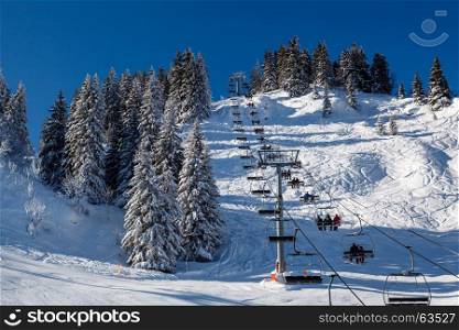 Sunny Ski Slope and Ski Lift near Megeve in French Alps, France
