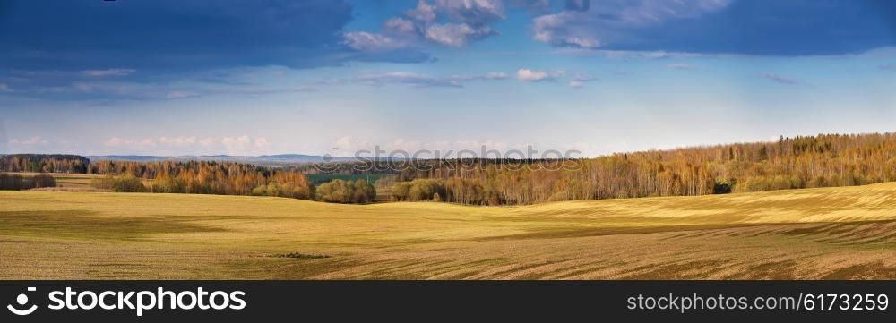 Sunny spring fields in the evening. Belarus