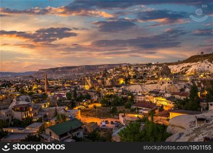 Sunny sunset over Goreme, ancient town in Cappadocia. Sunset over Goreme