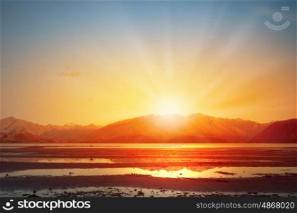 Sunrise above mountain . Natural landscape and sun rising at skyline