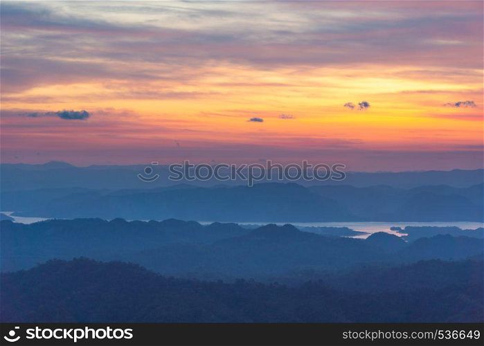 Sunrise and mountain in morning. mist on top mountain in morning