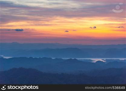 Sunrise and mountain in morning. mist on top mountain in morning