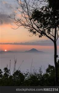 Sunrise and sea of fog over Phu Thok Mountain at Chiang Khan in Loei Province, Thailand
