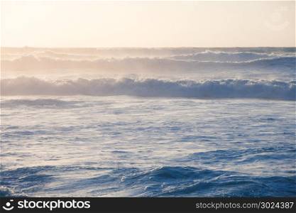 Sunrise and shining waves in ocean. Sunrise and shining waves in ocean. Nature sea landscape
