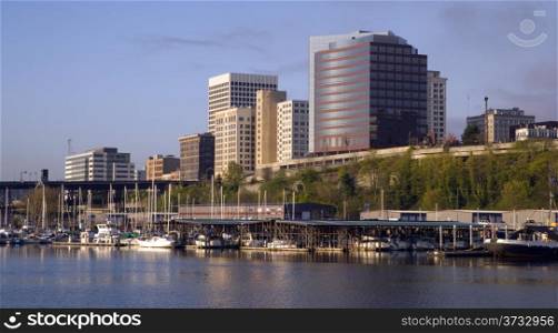 Sunrise appears as the light hits the Tacoma Washington waterfront in the Northwest United States
