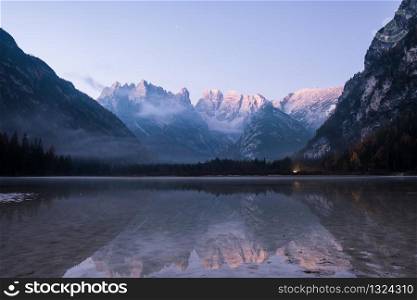 Sunrise at autumn mountain lake. Lago di Landro, Dolomites Alps, Italy. Sunrise at autumn mountain lake. Lago di Landro, Dolomites Alps,