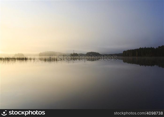 Sunrise at the lake in eastern part of Finland