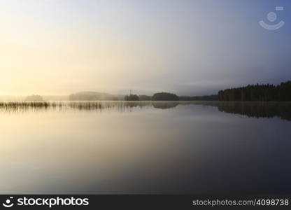 Sunrise at the lake in eastern part of Finland