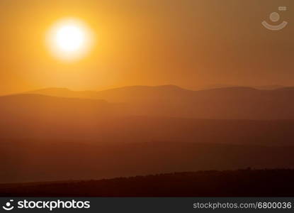 Sunrise composition. Layers of mountain.