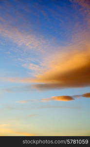 sunrise in the colored sky white soft clouds and abstract background