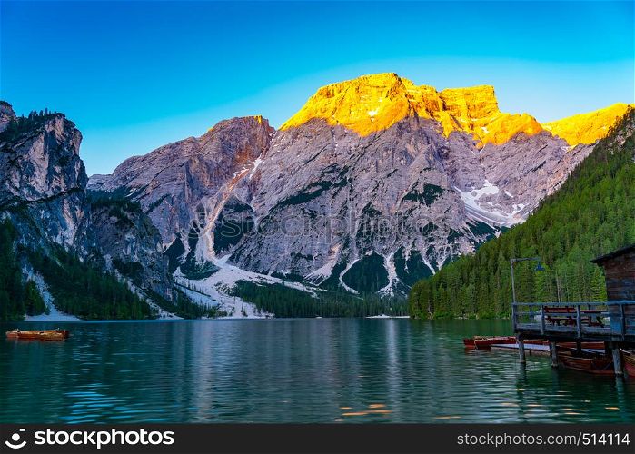 Sunrise light on the Mount Seekofel of the Dolomites at the Lake Braies or Lake Prags in South Tyrol, Italy
