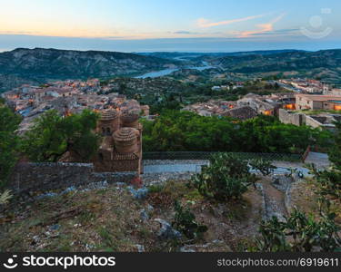 Sunrise old medieval Stilo famos Calabria village view, southern Italy. Medieval Cattolica di Stilo Byzantine church in front.