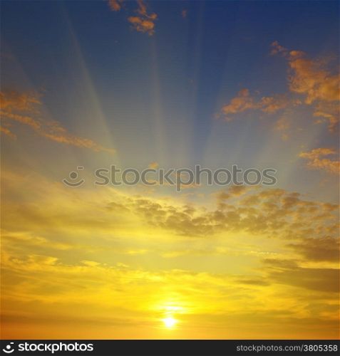 sunrise on the background of cloudy sky