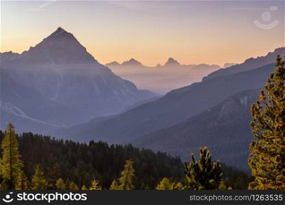 Sunrise over alpine peaks and The Tofane Group in the Dolomites, Italy, Europe