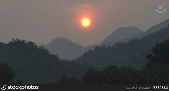 Sunrise over mountain range, Miyun County, Beijing, China
