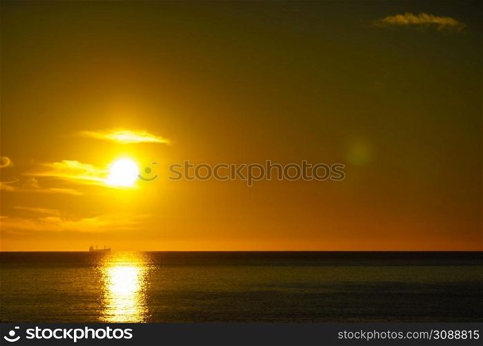 Sunrise over sea. Bright sun under the water surface. Sun up above horizon. Morning seascape.. Sunrise over sea. Morning seascape.