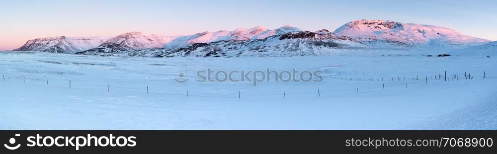 Sunrise over snow-covered mountains, Iceland, Europe