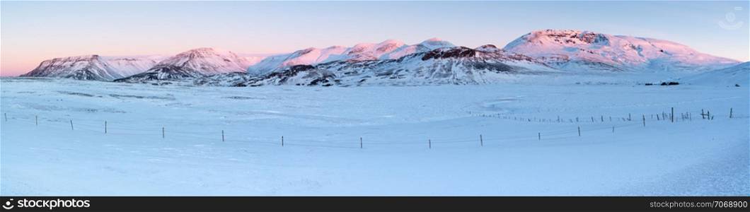 Sunrise over snow-covered mountains, Iceland, Europe