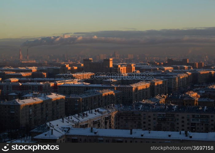 Sunrise over the city. Urban cityscape.