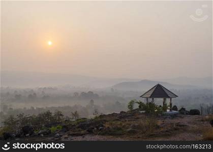 Sunrise over the hills that stretch with pavilion, Nakhonnayok Thailand