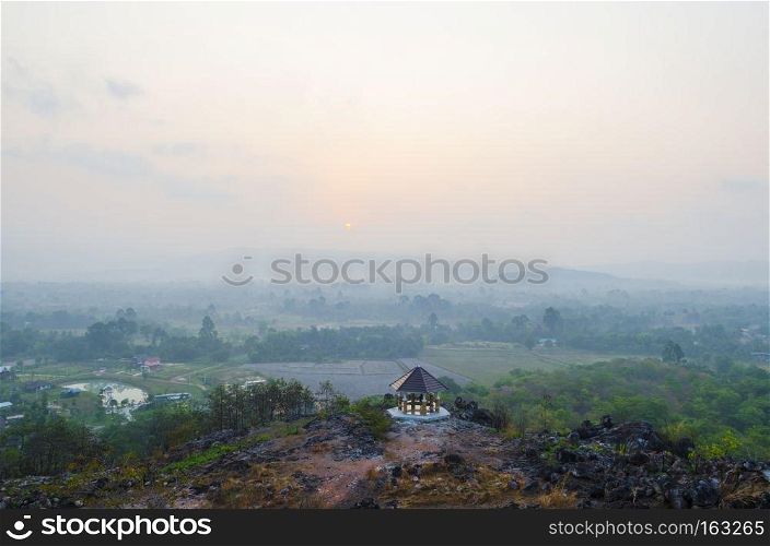 Sunrise over the hills that stretch with pavilion, Nakhonnayok Thailand