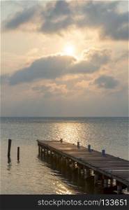 Sunrise Over Wooden Jetty. Sunrise over a wooden jetty with dramatic sky