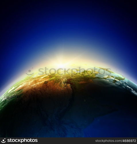 Sunrise. Sun rising above Earth planet. Conceptual photo. Elements of this image are furnished by NASA