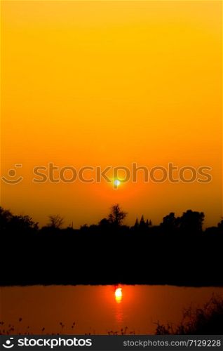 Sunrise with bright colors in clouds, concept for early morning wake up