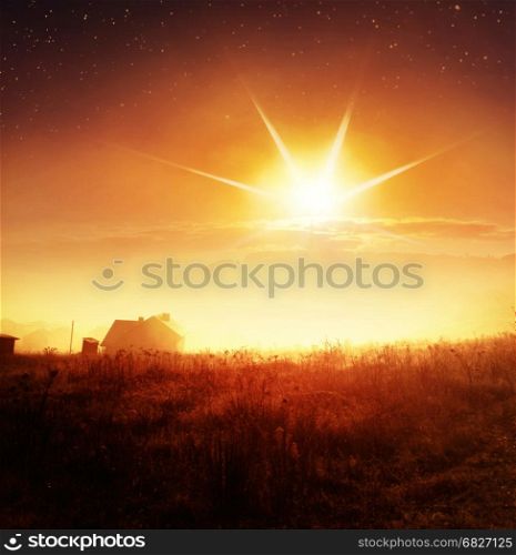 sunrise with fog over countryside at autumn