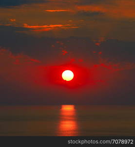 Sunrise with sun track on sea