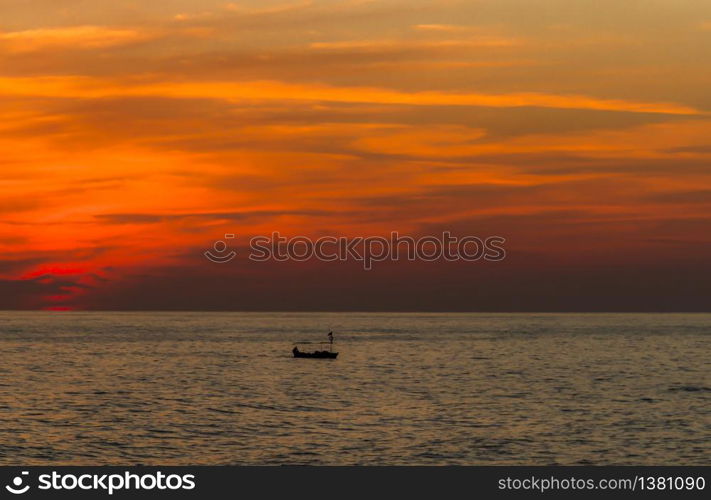 Sunset and fishing boat in Turkey