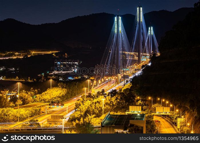 Sunset and light illumination of Tsing ma bridge landmark suspension bridge in Tsing yi area of Hong Kong China.