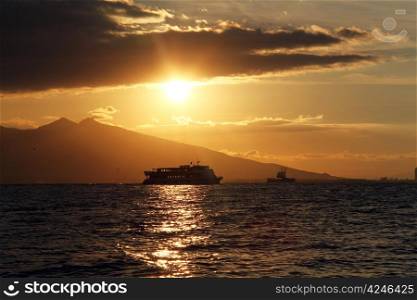 Sunset and ships near the coast in Izmir, Turkey
