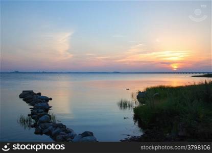 Sunset at a calm bay in summertime. From the swedish island oland.