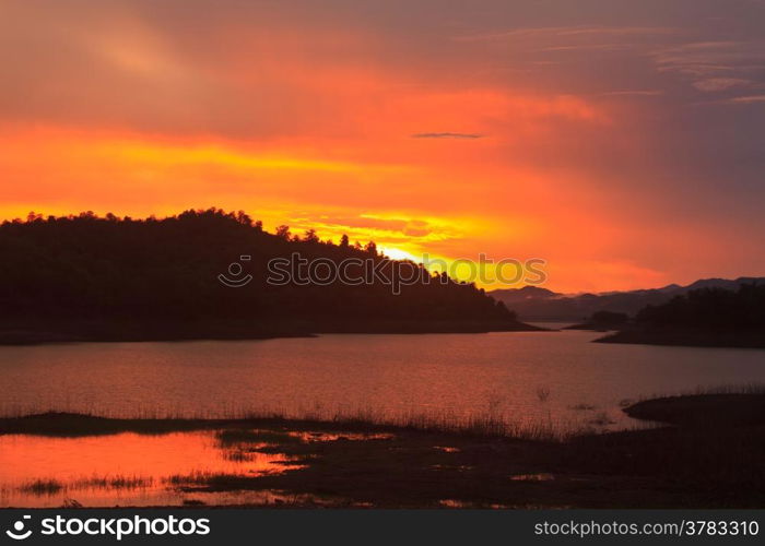 Sunset at lake, Kaeng Krachan Dam on Silhouette