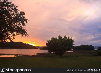 Sunset at lake, Kaeng Krachan Dam on Silhouette
