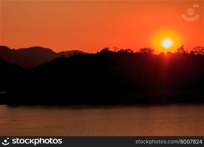 Sunset at lake, Kaengkrachan National Park Thailand,Sunset over lake with the beautiful cloud