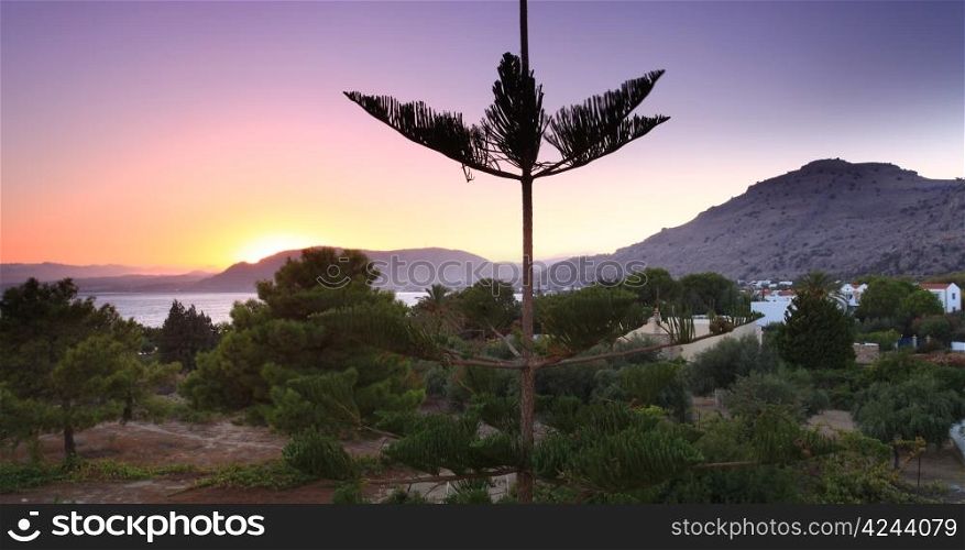 Sunset at Pefkos beach Rhodes Island in Greece