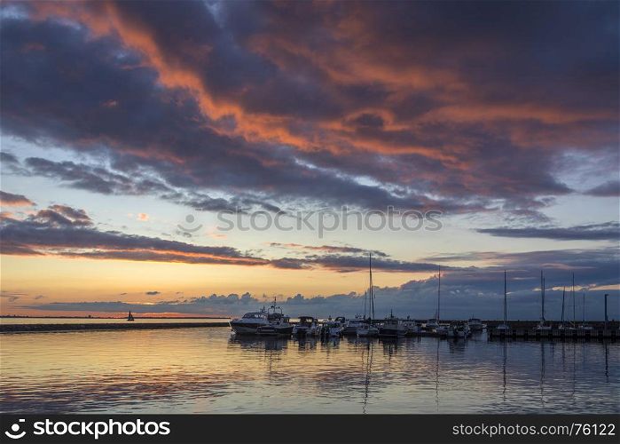Sunset at Pirita Marina, Tallinn in Estonia. Pirita is one of the most prestigious and wealthiest districts of Tallinn, due to its beach and yachting harbour. Pirita beach is the largest in area.