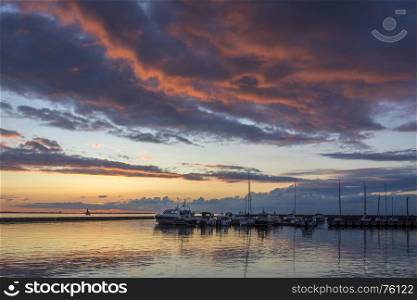 Sunset at Pirita Marina, Tallinn in Estonia. Pirita is one of the most prestigious and wealthiest districts of Tallinn, due to its beach and yachting harbour. Pirita beach is the largest in area.